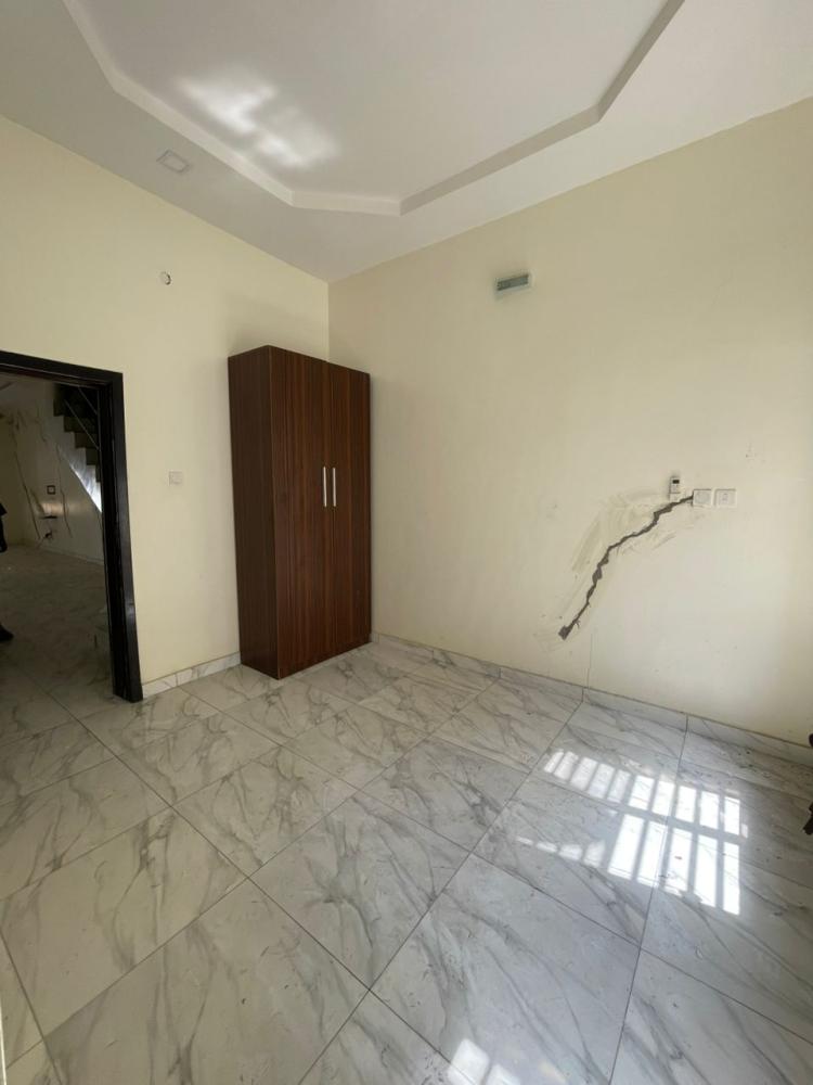Spacious single room– Ikota Villa Estate (Close to Mega Chicken)