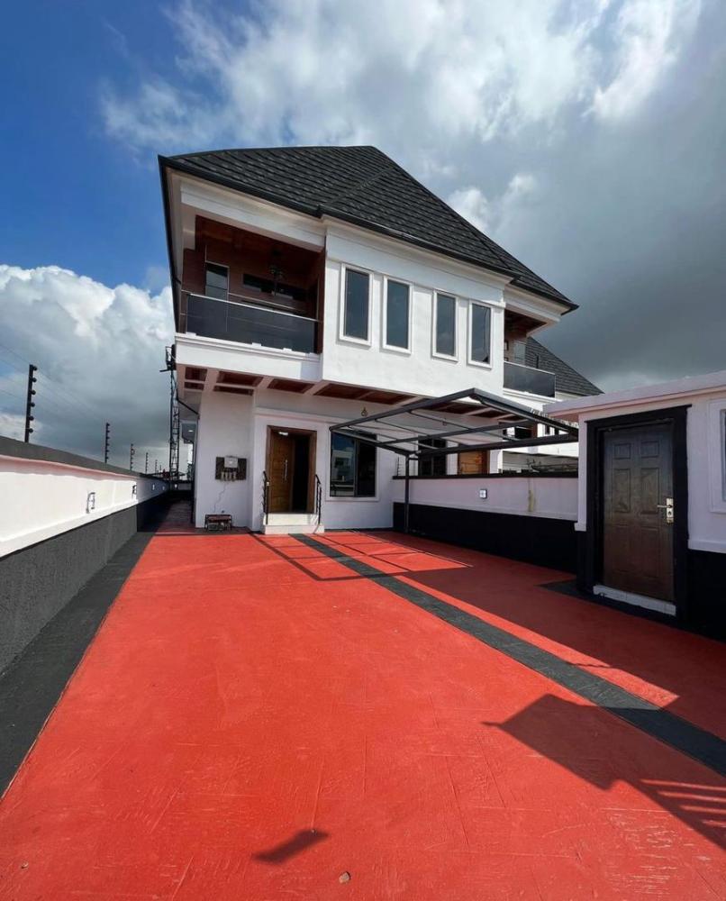 Front view of house and compound