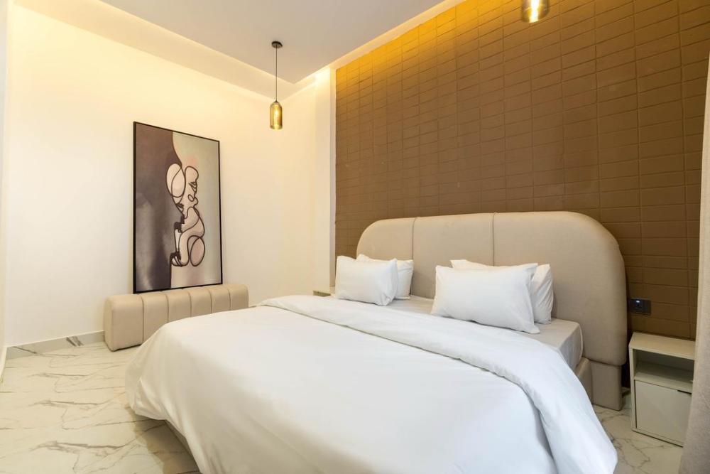 2 Bedroom Apartments With PS 5, Swimming Pool, and Gym Available for Booking Located At Lekki Phase 1, Off Fola Osibo.