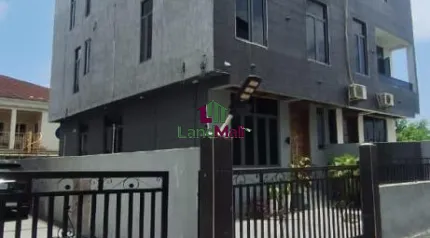 Front view of house and compound 