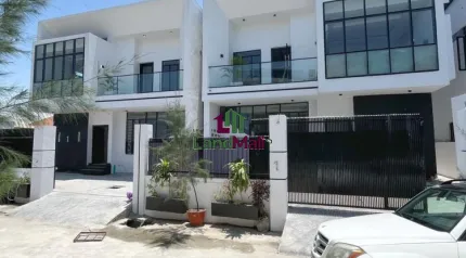 Front view of house and compound 