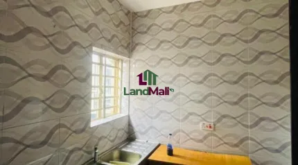 A room and parlor with two toilet  And private (closed ) kitchen 