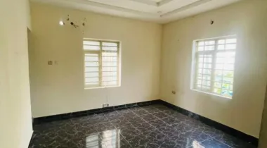 A room and parlor with two toilet  And private (closed ) kitchen 