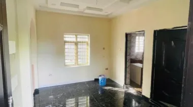 A room and parlor with two toilet  And private (closed ) kitchen 