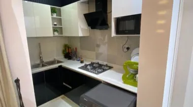 Kitchen equipped with washing machine