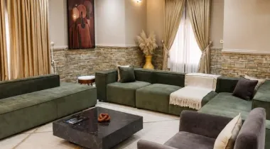 The Eniville Villa is a 3-bedroom, 2.5-bathroom home (2 ensuite) with two living rooms, a spacious kitchen, and a serene outdoor space perfect for relaxation or children’s play.