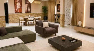 The Eniville Villa is a 3-bedroom, 2.5-bathroom home (2 ensuite) with two living rooms, a spacious kitchen, and a serene outdoor space perfect for relaxation or children’s play.