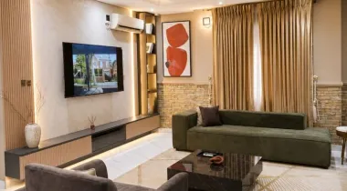 The Eniville Villa is a 3-bedroom, 2.5-bathroom home (2 ensuite) with two living rooms, a spacious kitchen, and a serene outdoor space perfect for relaxation or children’s play.