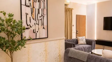 The Eniville Villa is a 3-bedroom, 2.5-bathroom home (2 ensuite) with two living rooms, a spacious kitchen, and a serene outdoor space perfect for relaxation or children’s play.