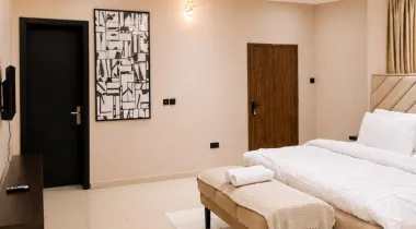 The Eniville Villa is a 3-bedroom, 2.5-bathroom home (2 ensuite) with two living rooms, a spacious kitchen, and a serene outdoor space perfect for relaxation or children’s play.