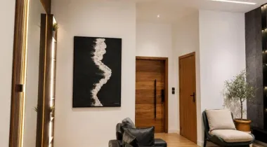 The Slate Unit is a tastefully furnished 2-bedroom apartment in Ikate, Lekki, designed with rich, contemporary interiors and clean architectural lines. Featuring a sophisticated dark-toned aesthetic, premium finishes, and thoughtfully curated spaces, it's ideal for business travellers, couples, weekend getaways, or extended stays seeking comfort with character.
