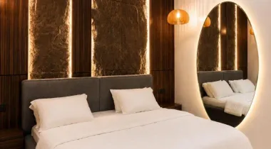 The Slate Unit is a tastefully furnished 2-bedroom apartment in Ikate, Lekki, designed with rich, contemporary interiors and clean architectural lines. Featuring a sophisticated dark-toned aesthetic, premium finishes, and thoughtfully curated spaces, it's ideal for business travellers, couples, weekend getaways, or extended stays seeking comfort with character.