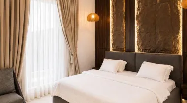 The Slate Unit is a tastefully furnished 2-bedroom apartment in Ikate, Lekki, designed with rich, contemporary interiors and clean architectural lines. Featuring a sophisticated dark-toned aesthetic, premium finishes, and thoughtfully curated spaces, it's ideal for business travellers, couples, weekend getaways, or extended stays seeking comfort with character.