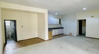 2 Bedroom Apartment on the ground floor with an open plan Kitchen.