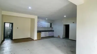 2 Bedroom Apartment on the ground floor with an open plan Kitchen.