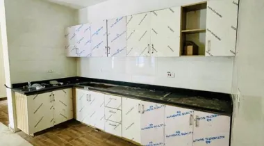 2 Bedroom Apartment on the ground floor with an open plan Kitchen.