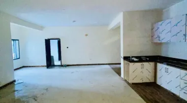 2 Bedroom Apartment on the ground floor with an open plan Kitchen.