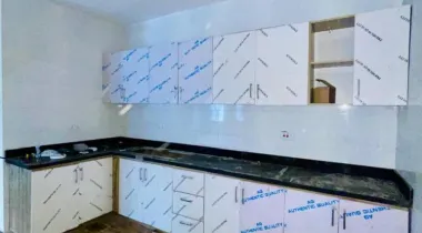 2 Bedroom Apartment on the ground floor with an open plan Kitchen.