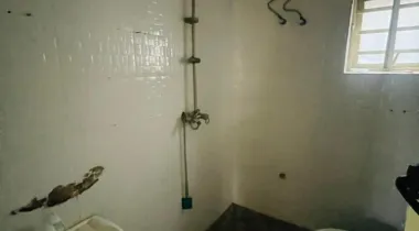 A room and parlor with two toilet  And private (closed ) kitchen 