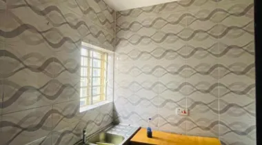 A room and parlor with two toilet  And private (closed ) kitchen 