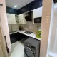 Kitchen equipped with washing machine