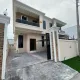 Front view of house and compound