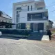Front view of house and compound