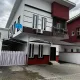 Front view of house and compound