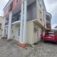 Front view of house and compound