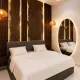 The Slate Unit is a tastefully furnished 2-bedroom apartment in Ikate, Lekki, designed with rich, contemporary interiors and clean architectural lines. Featuring a sophisticated dark-toned aesthetic, premium finishes, and thoughtfully curated spaces, it's ideal for business travellers, couples, weekend getaways, or extended stays seeking comfort with character.