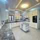 EXQUISITELY FINISHED LUXURY 4 BEDROOM FULLY DETACHED DUPLEX WITH  BQ, SWIMMING POOL, LAUNDRY ROOM AND It HAS A 3 LIVING ROOM AND A GATEHOUSE